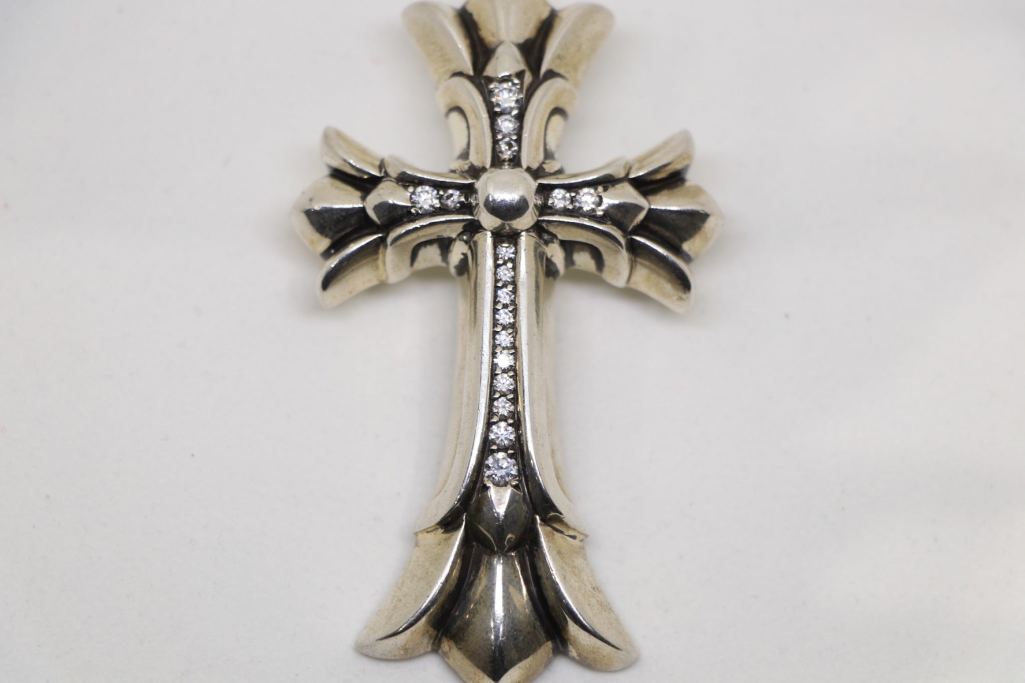 Chrome Hearts diamond cross pendant available at AVNTGRDNY
