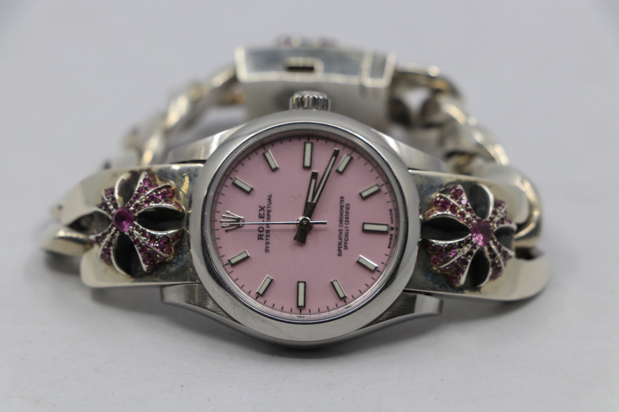 Rolex Oyster Perpetual pink dial on Chrome Hearts silver bracelet with pink sapphires at AVNTGRDNY